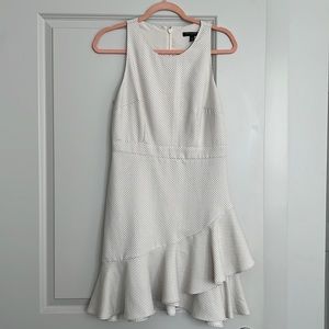 Workwear - Cream polka dot high low dress; sleeveless